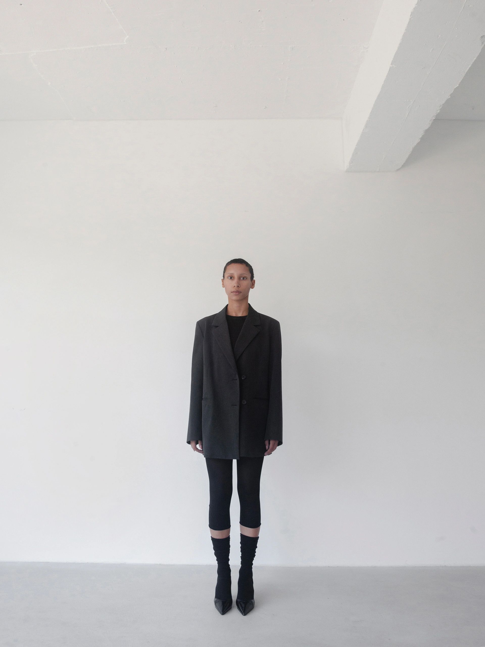Portrait of a stylish shopper in minimalist fashion